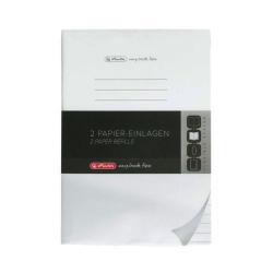 Weiße Papier-Einlagen für ein Notizbuch. Verpackt in einer schwarzen Banderole mit dem Hinweis auf zwei Nachfüllungen.