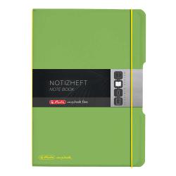 Grünes Notizheft mit schwarzem Aufkleber. Enthält den Text 'NOTIZHEFT' und 'NOTE BOOK'.