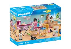 Playmobil Set mit einer Tierhandlung. Enthält Figuren, Tiere und Möbel.