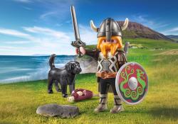 Playmobil-Figur eines Wikingers mit Schwert und Schild. Ein schwarzer Hund und ein Stück Fleisch liegen im Vordergrund.