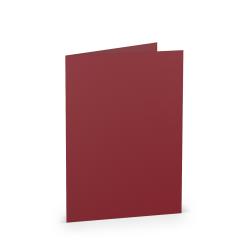 Rotes Notizbuch mit grauem Deckblatt. Auf dem Cover steht Rössler und Coloretti.