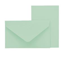 Mintgrüner Umschlag mit spitzem Deckel. Daneben ein passendes Blatt Papier.