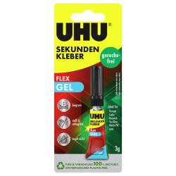 Kleber in einer kleinen Tube mit schwarzem Deckel. Verpackung in Gelb und Rot, mit Hinweisen zu Anwendung und Eigenschaften.