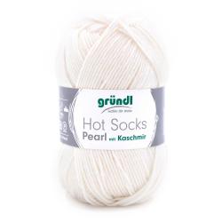 Wollknäuel in hellem Beige. Geeignet für Socken, enthält Kaschmir.