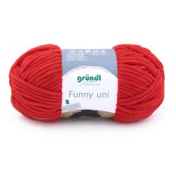 Rotes Garn in einem runden Knäuel. Material ist 100 Prozent Polyester.