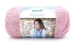 Wollknäuel in rosa mit melierten Farben. Auf dem Etikett ist eine Anleitung für einen Schal abgebildet.