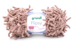 Garnknäuel in beige mit einer strukturierten Oberfläche. Verpackung zeigt den Namen 'Flipsy' und eine Anleitung für einfache Strickprojekte.