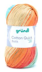 Garnknäuel in Batik-Design. Farben: Orange, Beige, Türkis. Label mit der Aufschrift 'gründl Cotton Quick Batik'.