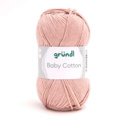 Rosa Baumwollgarn in einem runden Knäuel. Die Verpackung zeigt den Namen 'Baby Cotton' und das Markenlogo.