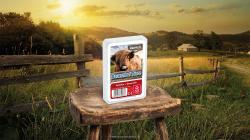 Spielkartenpackung mit dem Titel 'Bauernhof Tiere'. Abgebildet ist ein Kuhkopf auf der Vorderseite.