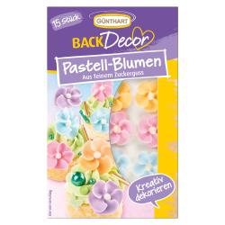 Verpackung mit bunten Zuckerguss-Blumen in Pastellfarben. 15 Stück. Dekorationsartikel für Backwaren.