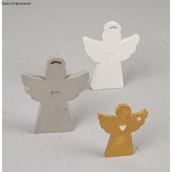 Silicon-Gießform für Engel und Flügel. Enthält verschiedene Formen. Verpackung zeigt Beispiele der gegossenen Figuren. Farben: Weiß, Gold, Silber.