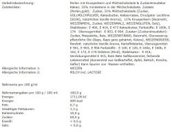 Flasche mit buntem Backdekor. Enthält Herzchen, Perlen und verschiedene Formen in Rot- und Rosatönen.