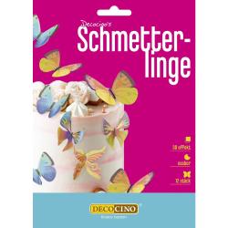 Verpackung mit essbaren Schmetterlingen für Tortendekoration. Bunte, dreidimensionale Schmetterlinge auf rosa Hintergrund.