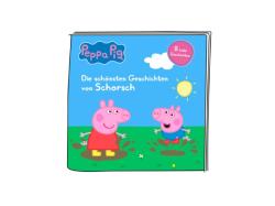 Figur von Peppa Wutz in blauer Kleidung. Im Hintergrund ein Buch mit dem Titel 'Die schönsten Geschichten von Schorsch'.