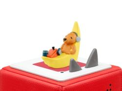 Figur eines Bären in einer gelben Banane. Dazu ein Buchcover mit dem Titel 'Ohrenbär - Mulles Zaubersteinchen'.