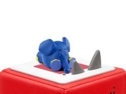 Blauer Gummielefant, liegend. Neben einem bunten Buchcover. Titel: 'Die Sendung mit dem Elefanten'.