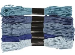 Sechs Stränge Stickgarn in verschiedenen Blautönen. Oben helles Blau, dann dunkleres Blau, gefolgt von Graublau und Dunkelblau. Alle Stränge sind mit schwarzem Band zusammengehalten.