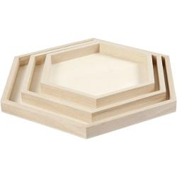 Drei hexagonale Holztabletts in verschiedenen Größen. Die Oberfläche ist hell und glatt.