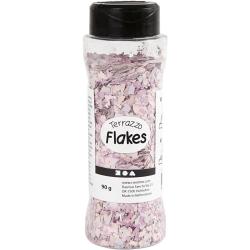 Haufen von kleinen, unregelmäßigen, farbigen Scherben in Rosa und Weiß. Die Stücke sind dünn und variieren in der Form.