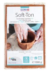 Verpackung mit Soft-Ton, natürlicher Ton in terracotta. Abgebildete Hände formen einen Topf. Mehrsprachige Beschreibung auf der Vorderseite.