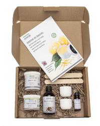 DIY-Kit für Naturkosmetik. Verpackung in braunem Karton. Enthält Informationen zur Herstellung einer Handcreme mit Orangenöl. Vegan, mehrsprachig beschriftet.