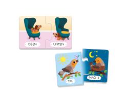 Spielverpackung für Mini-Puzzles mit dem Titel 'Gegensaetze'. Illustrationen von Tieren und Wörtern wie Tag, Nacht, groß und klein.