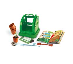 Mini-Gewächshaus in grün mit Pflanzen und Töpfen. Enthält Zubehör zum Pflanzen und Experimentieren.