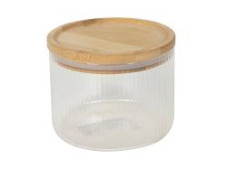 Glasbehälter mit geriffelter Oberfläche und einem Holzdeckel. Transparent und schlicht.