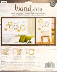 Wanddeko mit verschiedenen kreisförmigen Elementen in Gold, Silber und Braun. Selbstklebend und wiederverwendbar.