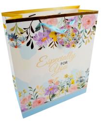 Geschenktüte mit bunten Blumenmotiven. Auf der Vorderseite steht 'Especially For You' in goldener Schrift. Tragegriffe in hellblau.