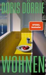 Buchcover von 'Wohnen' von Doris Dörrie. Gelbe Küchenoberfläche mit Äpfeln auf einem Teller.