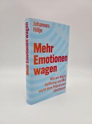 Buchcover mit dem Titel 'Mehr Emotionen wagen'. Farbige Schrift auf hellem Hintergrund, einfache Gestaltung.