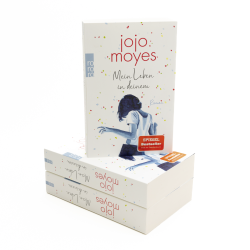 Buchcover von Jojo Moyes mit dem Titel 'Mein Leben in deinem'. Silhouette einer Frau vor bunten Konfetti.