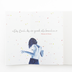 Buchcover von Jojo Moyes mit dem Titel 'Mein Leben in deinem'. Silhouette einer Frau vor bunten Konfetti.