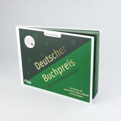 Buch mit grünem und schwarzem Cover. Titel: Deutscher Buchpreis, Adventskalender mit 24 Türchen, Fakten, Rätseln und Quizfragen.