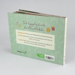 Offenes Buch mit Text und Illustrationen. Die Seite zeigt Anleitungen zum Häkeln mit goldfarbenen Garn und Symbolen.