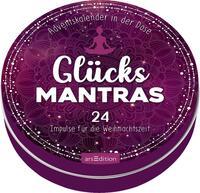 Runde Dose mit dem Titel 'Glücks Mantras'. Lila Farbton mit dekorativen Mustern.