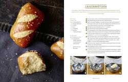 Buchcover mit dem Titel 'Brot backen in Perfektion mit Hefe'. Abgebildete Brote und Brötchen in verschiedenen Formen.