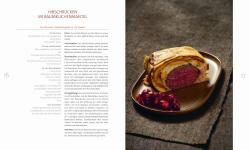 Buchcover mit dem Titel 'WILD'. Enthält 125 Rezepte aus Wald und Flur, abgebildet ist ein Gericht mit Wildfleisch.