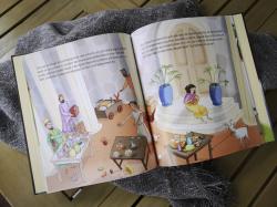 Buchcover mit dem Titel 'Die schönsten Jesus-Geschichten'. Illustration zeigt eine Person mit einem Schaf und zwei Kindern.