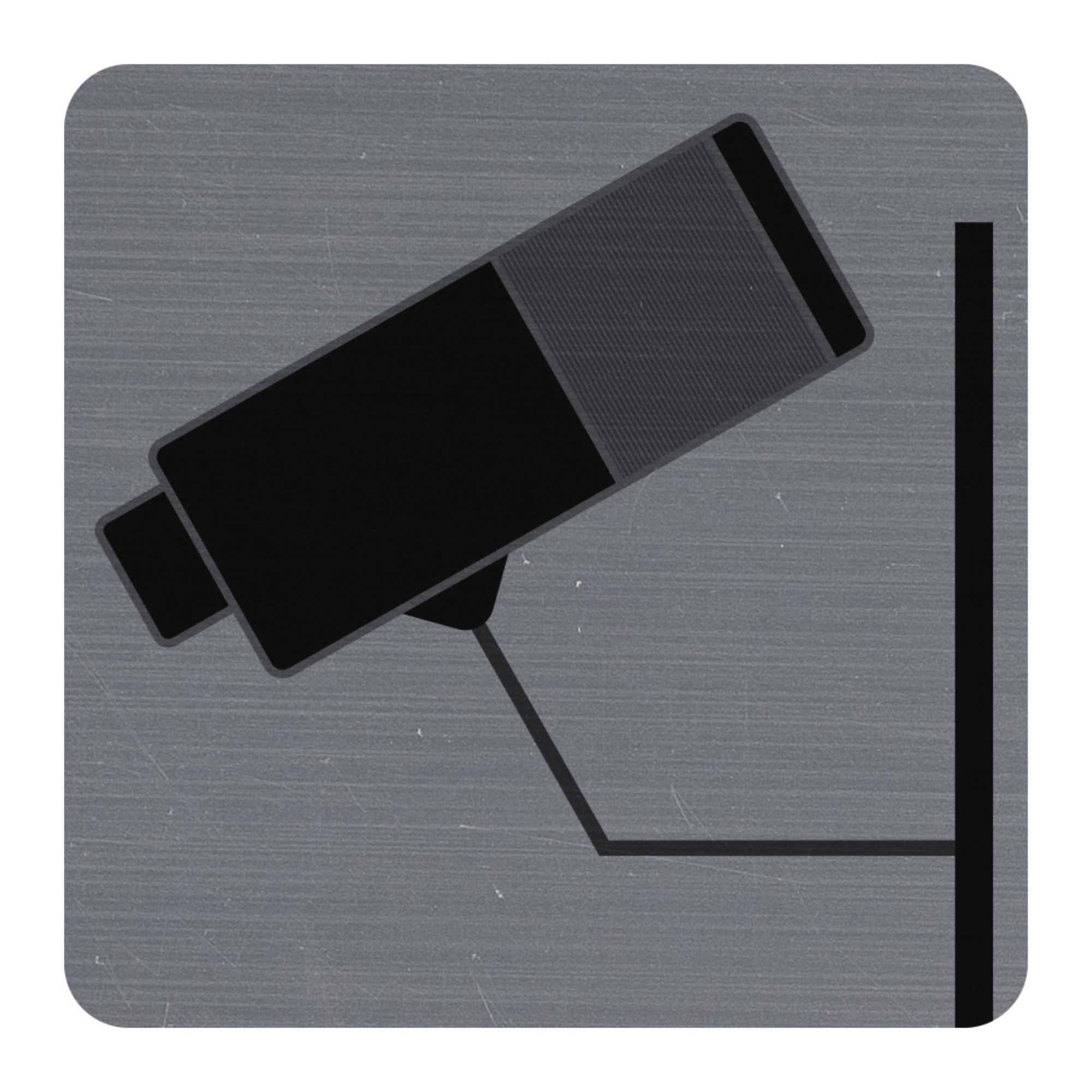 Schwarze Überwachungskamera auf grauem Hintergrund. Kamera ist schräg montiert.