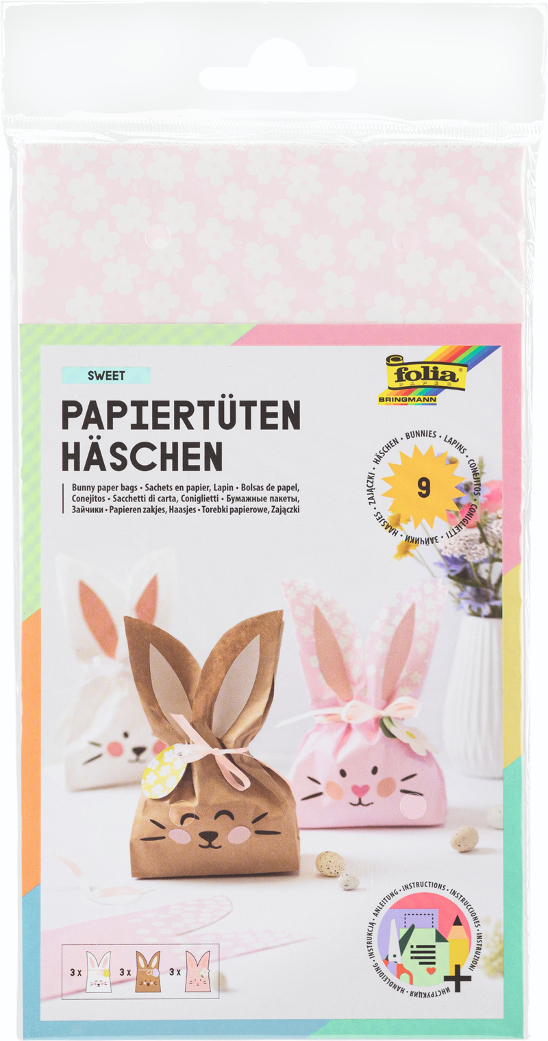 Papier-Tüten in Form von Hasen. Drei verschiedene Designs in Braun, Pink und Weiß.