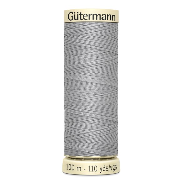 Grau-spool mit Nähgarn. 100 Meter lang. Aufgerollt, gleichmäßige Struktur.