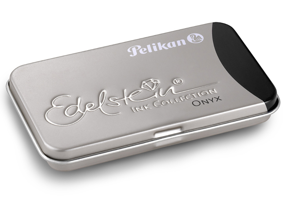 Metallbox mit dem Aufdruck Edelstein Ink Collection Onyx. Die Box hat eine glatte Oberfläche und abgerundete Ecken.