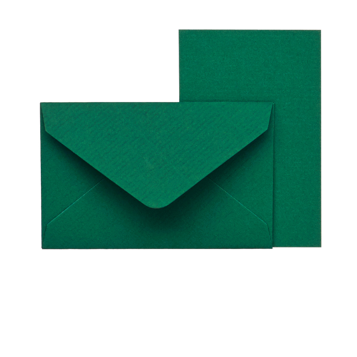 Grünes Kuvert mit passendem grünen Blatt Papier. Beide haben eine matte Oberfläche.