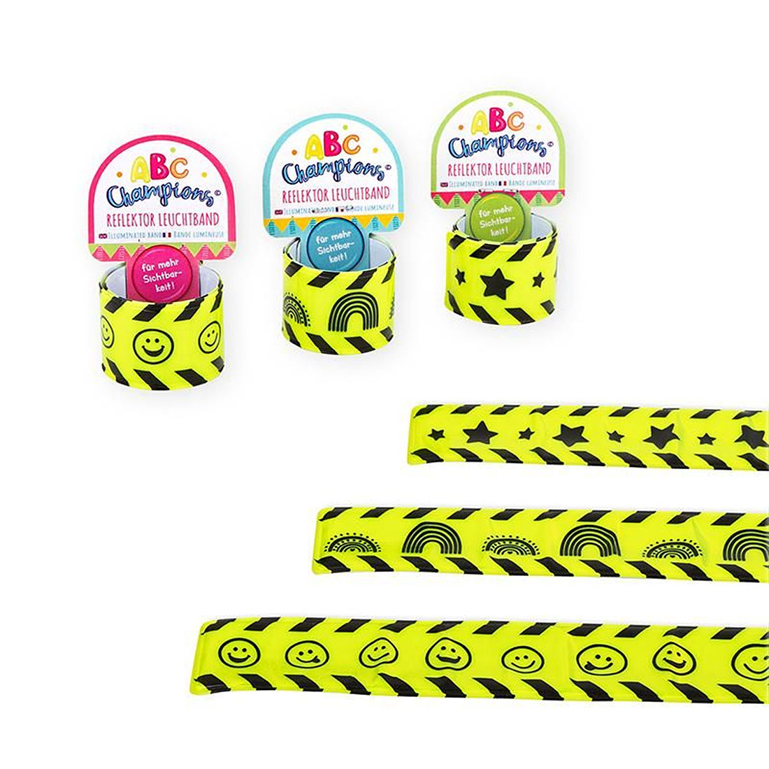 Drei Rollen reflektierendes Leuchtband in verschiedenen Designs. Farbenfroh mit Smileys, Regenbögen und Sternen.