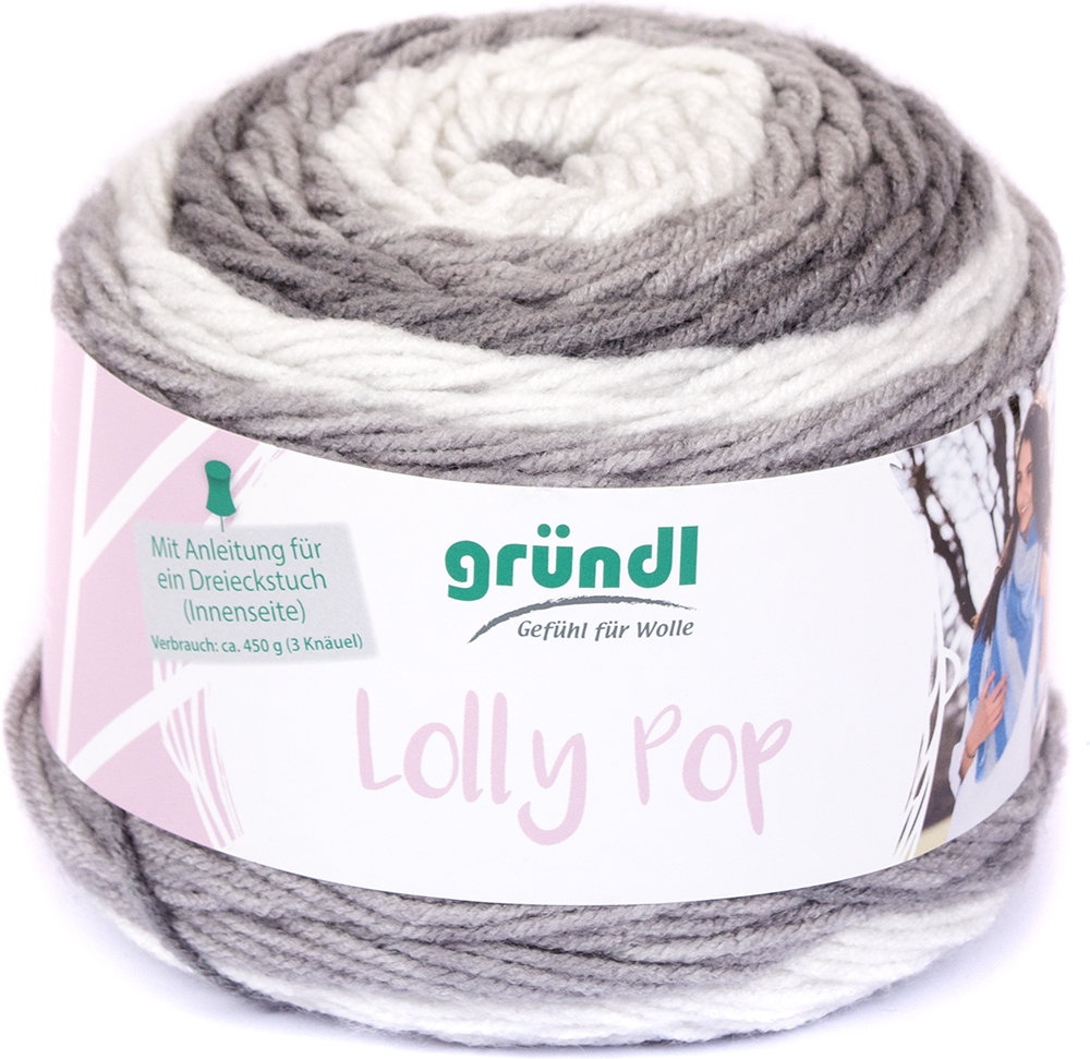 Garnknäuel in Grautönen mit weißen Akzenten. Verpackung zeigt den Namen 'Lolly Pop' und eine Anleitung für ein Dreieckstuch.