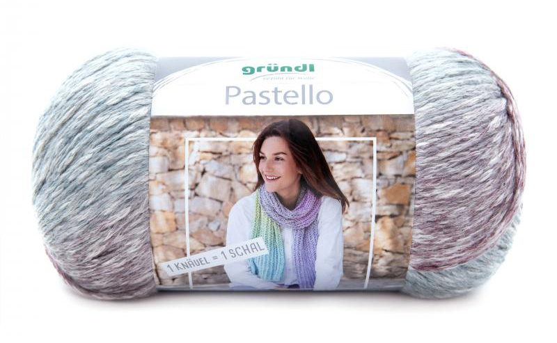 Garnknäuel in Pastellfarben. Abgebildet ist eine Frau mit einem Schal aus dem Garn.