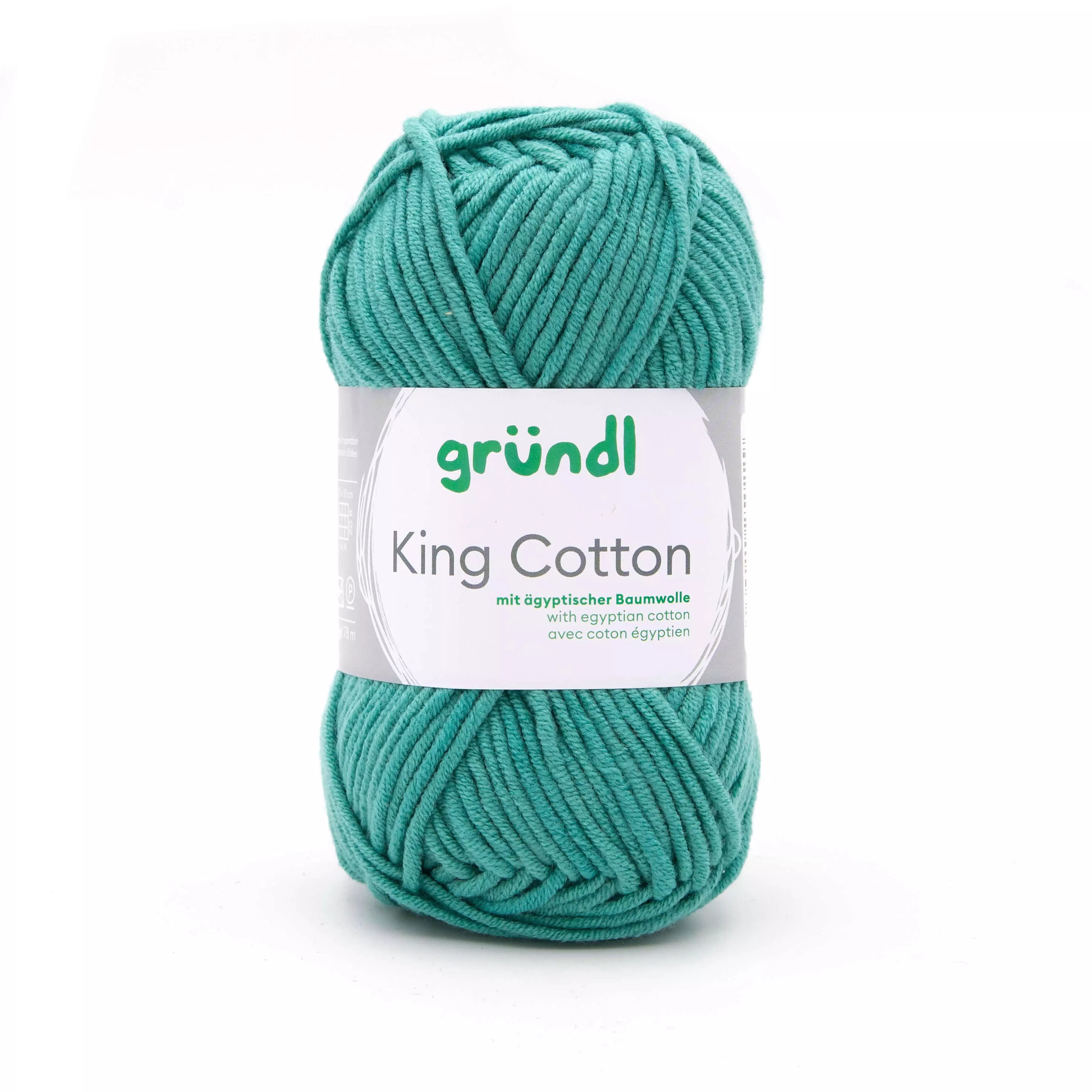 Grüner Baumwollgarn in einem Knäuel. Beschriftung mit dem Namen 'King Cotton'.